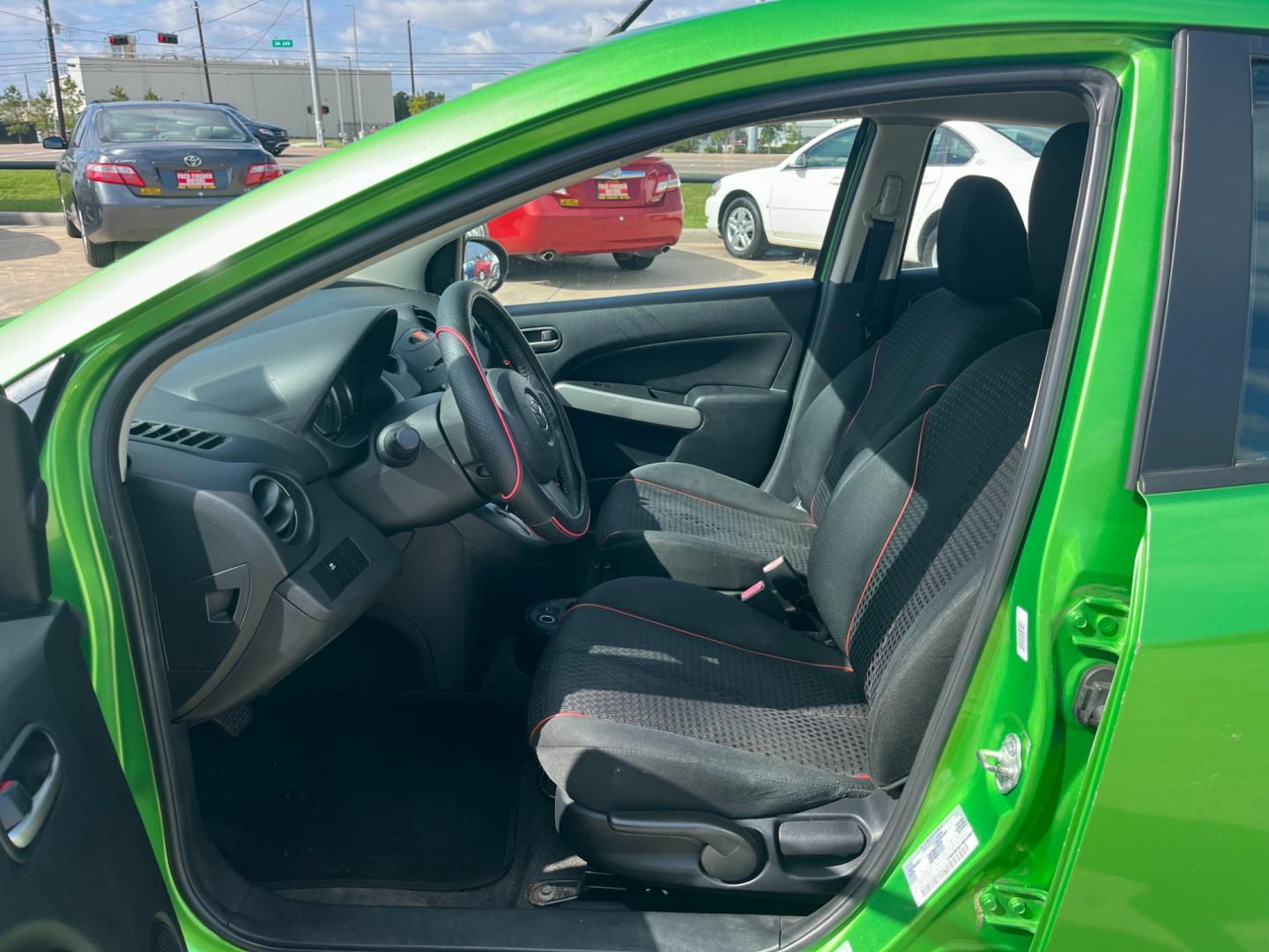 2013 green /black Mazda MAZDA2 Touring (JM1DE1LY1D0) with an 1.5L L4 DOHC 16V engine, Automatic transmission, located at 14700 Tomball Parkway 249, Houston, TX, 77086, (281) 444-2200, 29.928619, -95.504074 - Photo#8